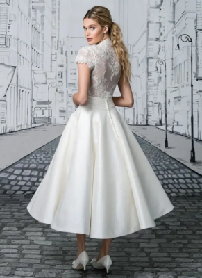 simple vintage wedding dress The Style Dresses Trending for 2025 The covered button back adds a vintage What is a Vintage Wedding