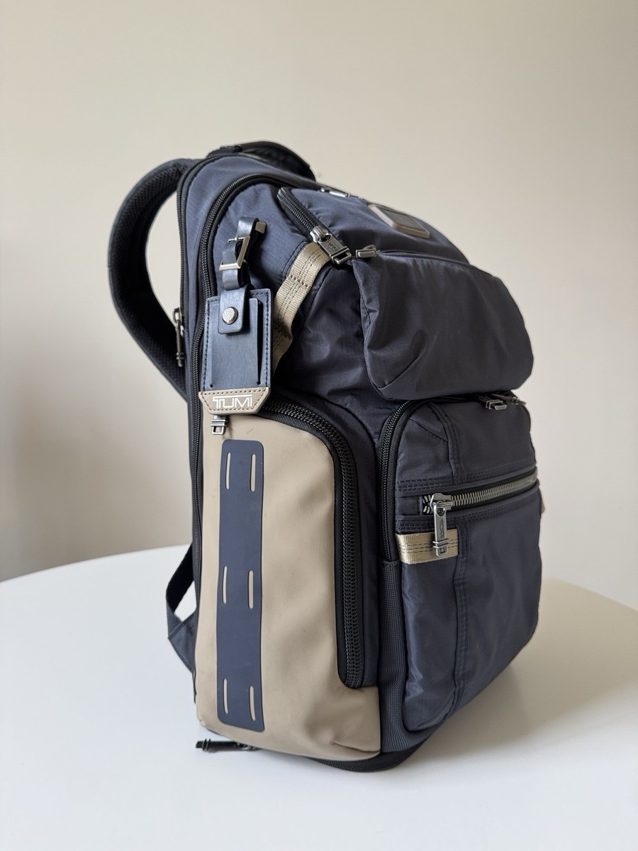 tumi alpha bravo nomadic backpack - midnight navy/khaki Backpack, Navy/Khaki, Midnight Navy/Khaki, Midnight Compartment Zip entry to main compartment Back padded zip laptop compartment TUMI Alpha Bravo Nomadic Backpack