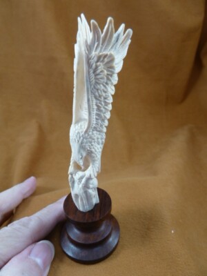 EAGLE-27 Eagle wings out holding fish shed ANTLER figurine Bali detailed carving