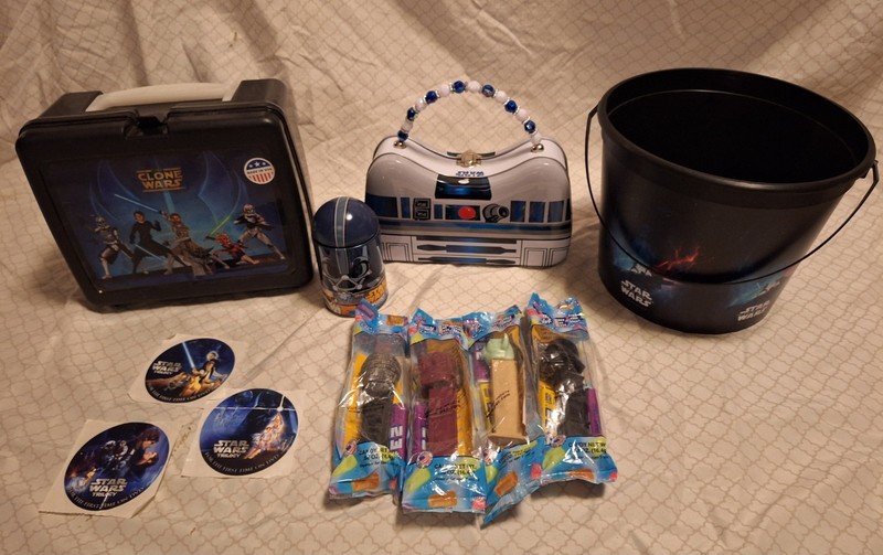 Star Wars stuff. Lunch box, purse, popcorn bucket, puzzle, stickers, pez