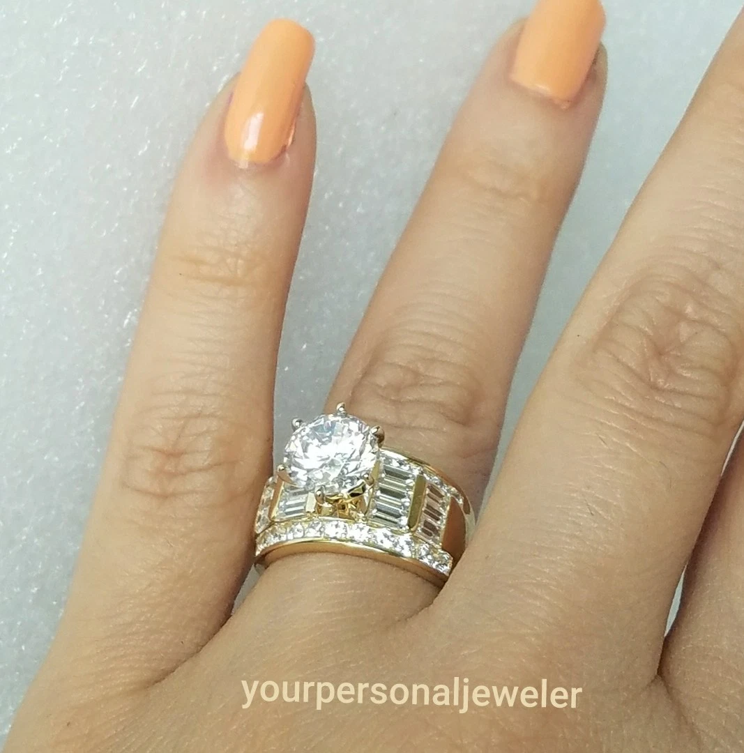 Big gold wedding hotsell rings for her