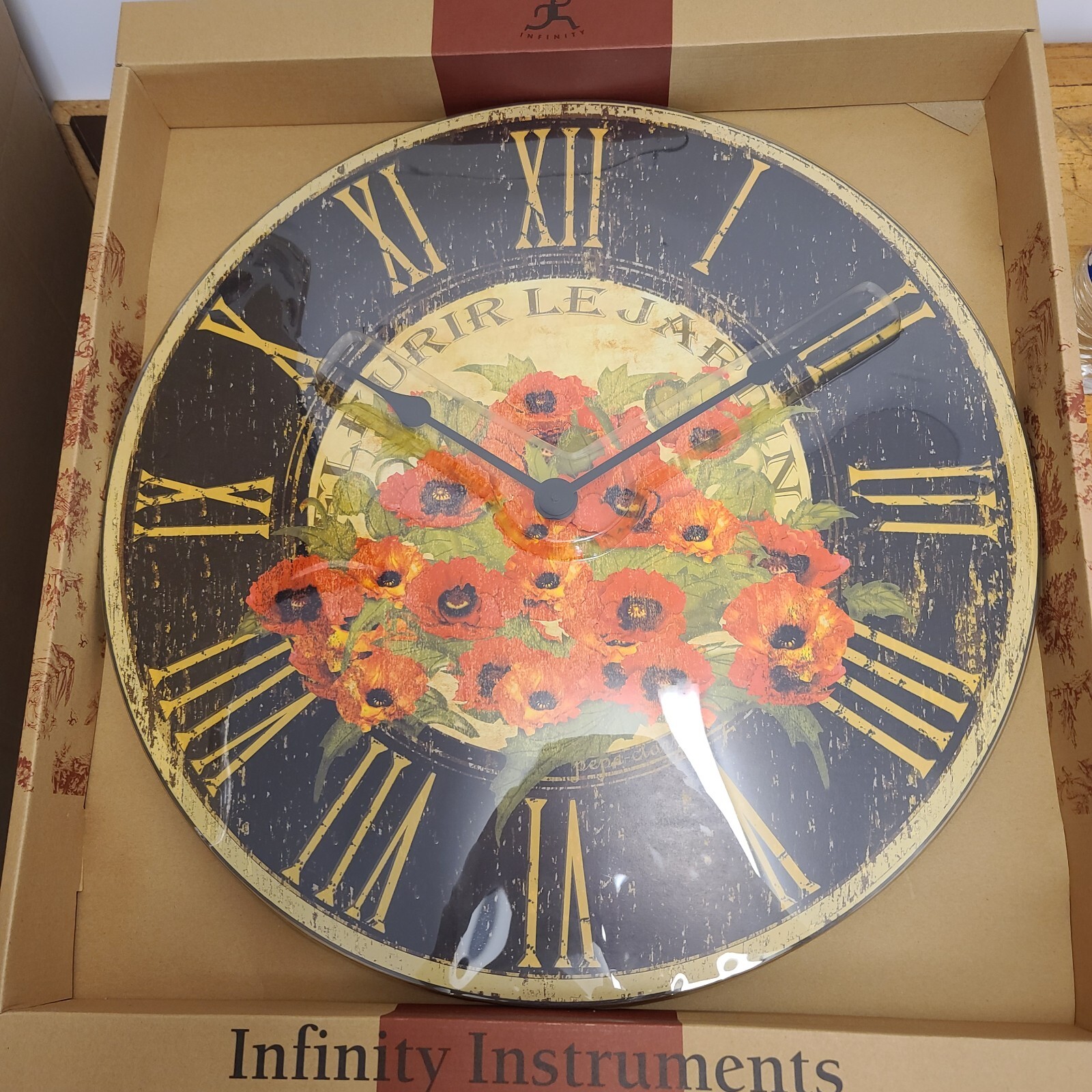 Infinity instruments wall clock 23-5/8" Le Jardin Red Po. New in box