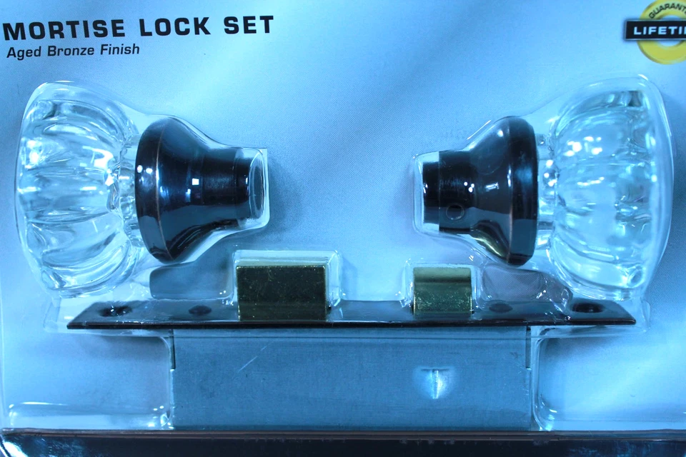 Juego de cerraduras de mortaja Defiant Hall and Closet perilla de vidrio acabado bronce envejecido Foto 3 de 4