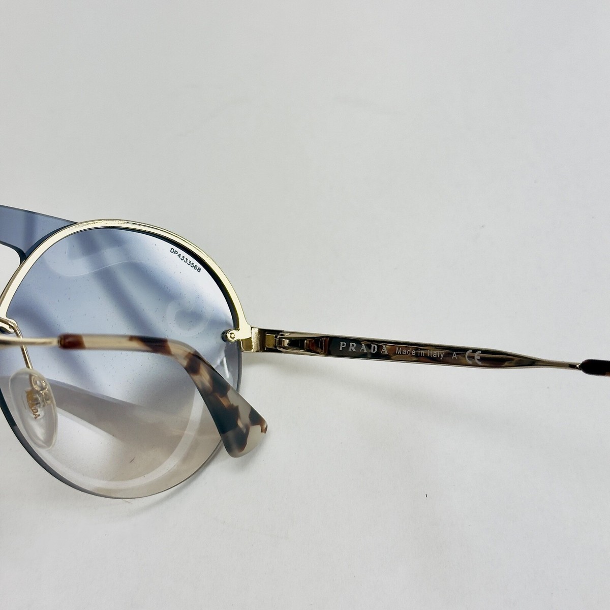 PRADA CINEMA 65T Round Swirl Gold Blue Sunglasses PR65TS Snoop