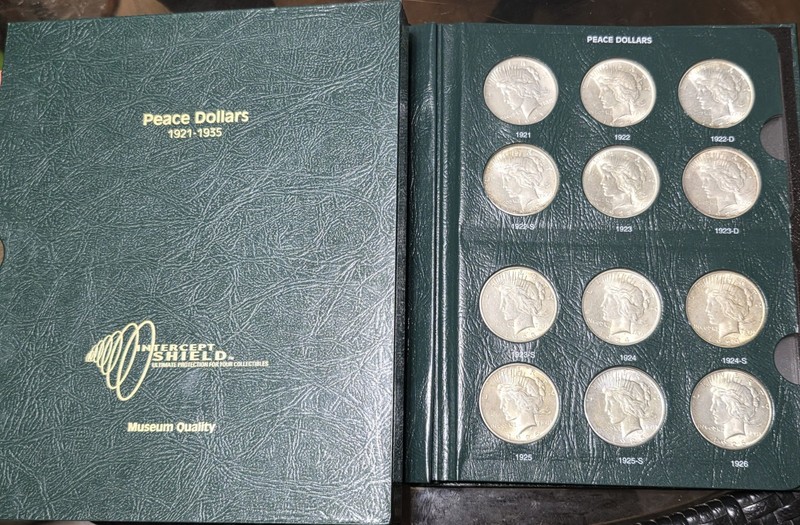Beautiful Complete Peace Dollar Set in Intercept Shield Album - High Grade Coins