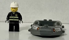 Lego (7238) City: Firefighter Minifigure With Rubber Raft Boat Piece