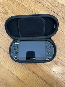Sony PS Vita black PCH-1000 OLED with charging cable, 256gb sandisk extreme.