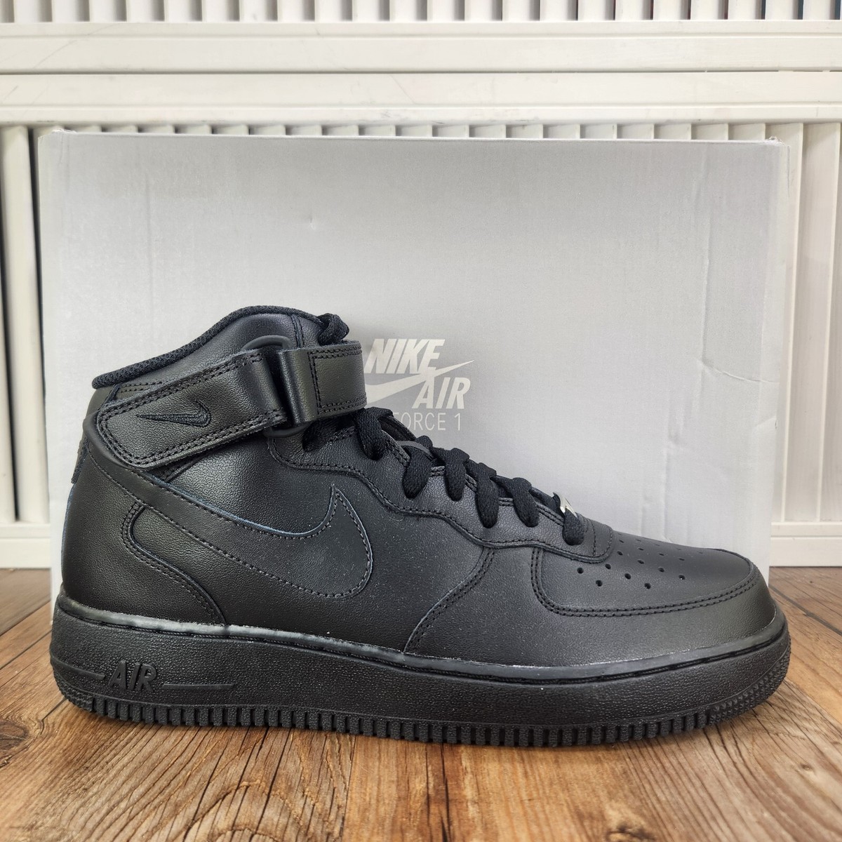 black air force ones mid tops