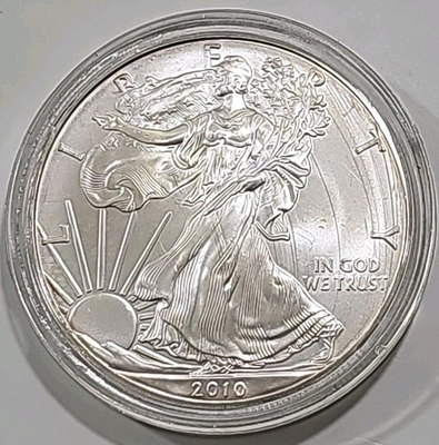 #ad 2010 1 oz American Silver Eagle Coin One Troy In Capsule Slight Gold Tone $136.77