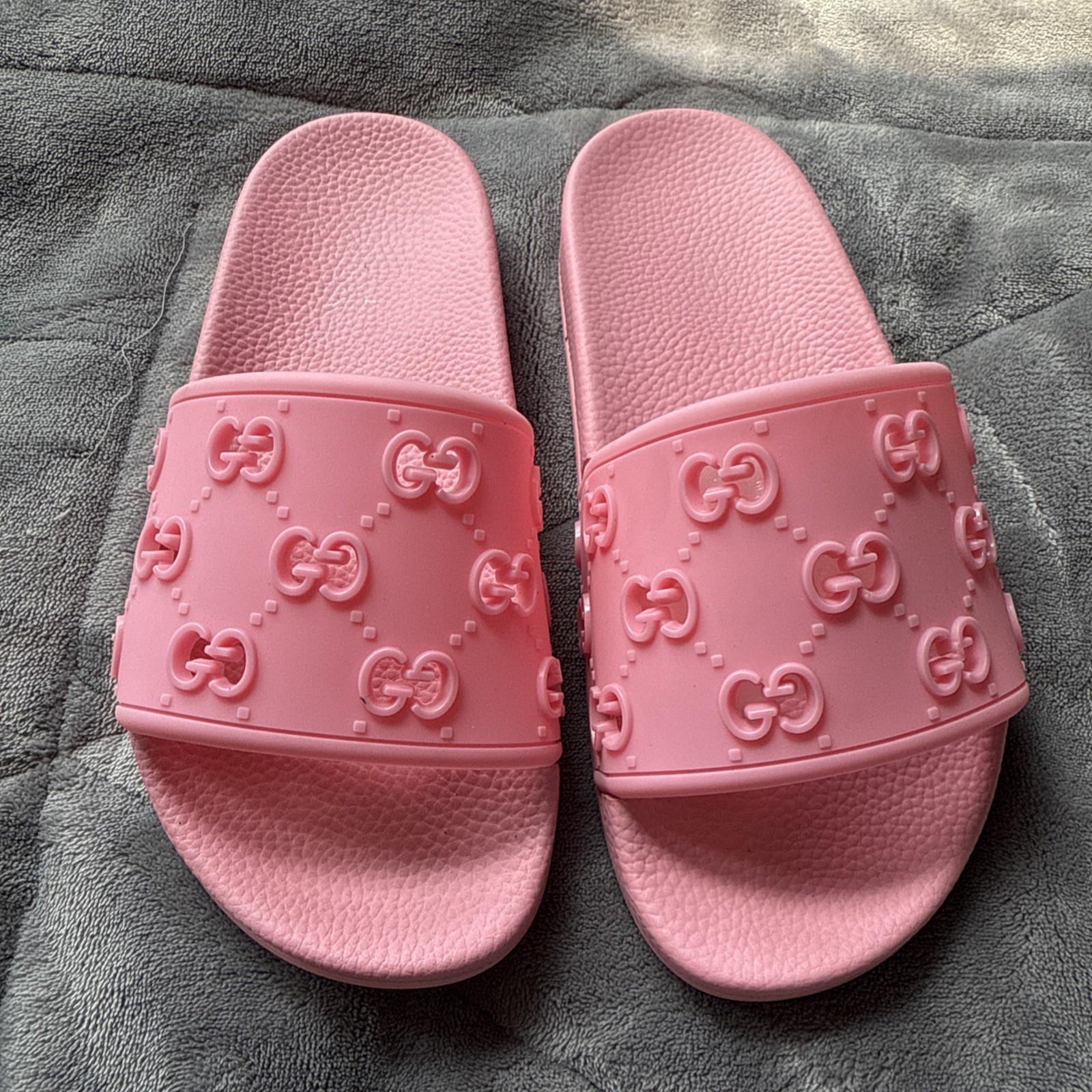 Gucci women's luxury slides with iconic logo