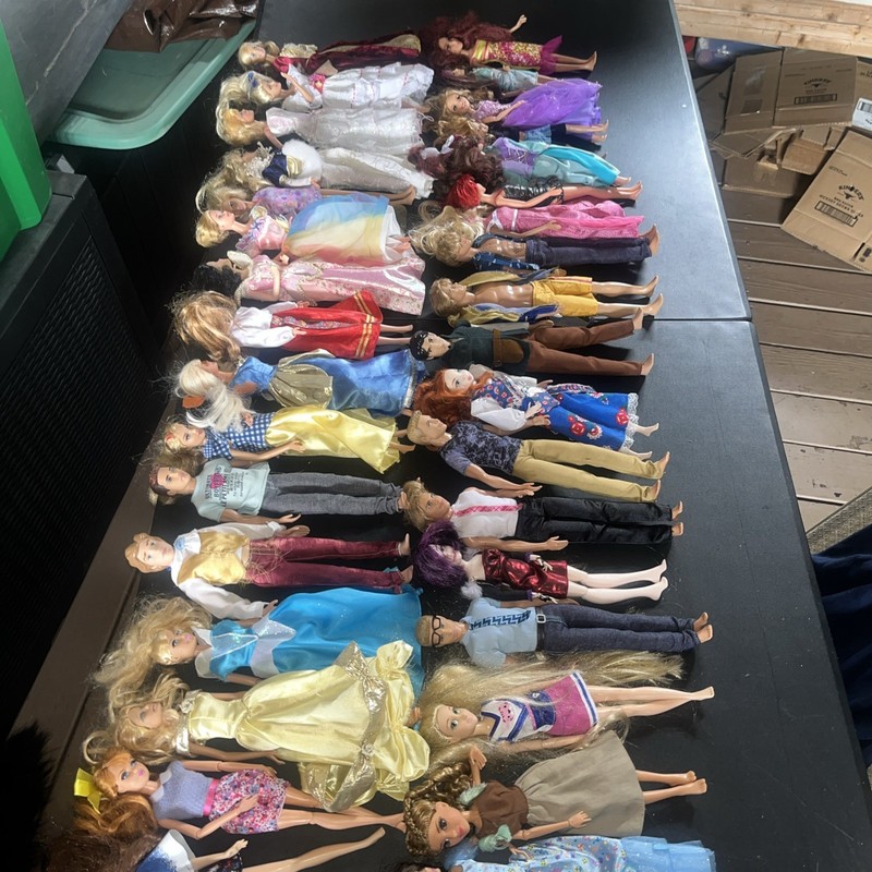Lot Of 37 Barbie’s And Others Clothed