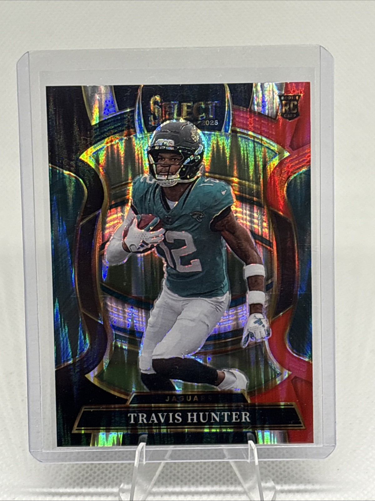 2025 Panini Select - Travis Hunter #28 Black & Red Prizm Shock. Jaguars