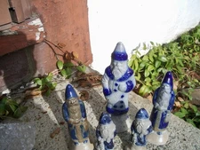 Lot 5 Rowe Pottery Works  Stoneware Santas  various sizes