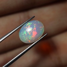 2 Cts 11,5x8,6 MM naturalny AAA zielony czerwony żółty ogień etiopski opal owalny kaboszon