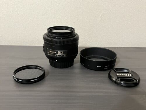 Nikon AF-S DX NIKKOR 35 mm f/1,8 G | Enthält Kappen, Motorhaube und kreisförmigen Polarisator - Bild 1 von 3