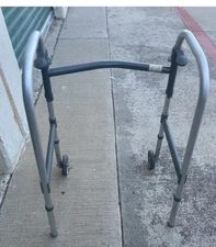 INVACARE Folding walker model 6291-A  adjustable height.  300 Lb Max