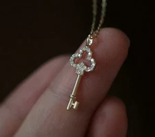 Antique Key Design Women's Pendant In 10K Yellow Gold & White Moissanites