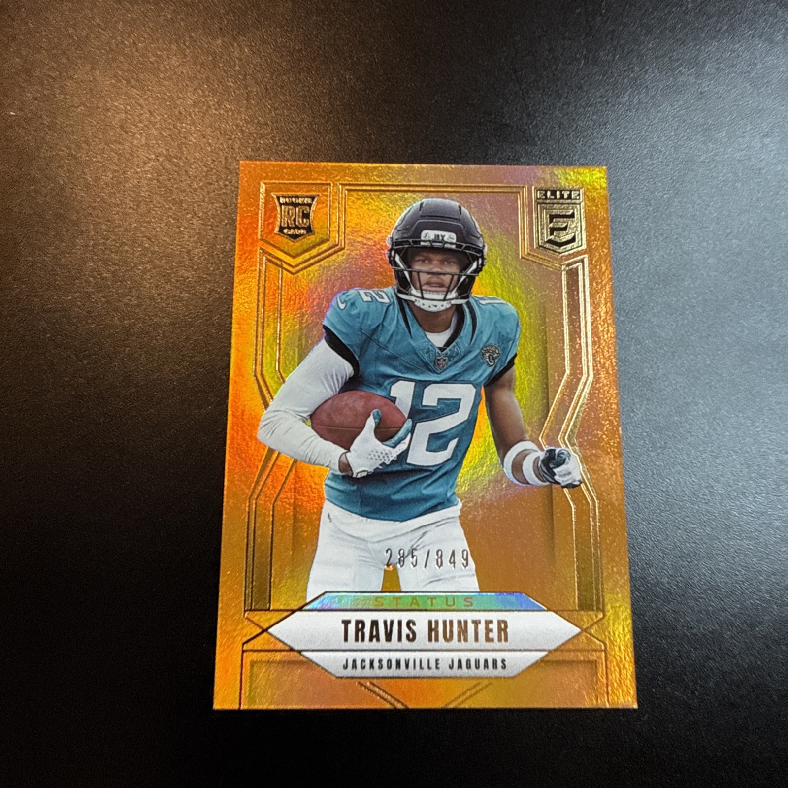 2025 Donruss Elite - Rookies Travis Hunter #114 Status Metallic Orange 285/849