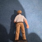 Painted Model Railroad Figure Man White Shirt Brown Pants on Black Base — photo 2
