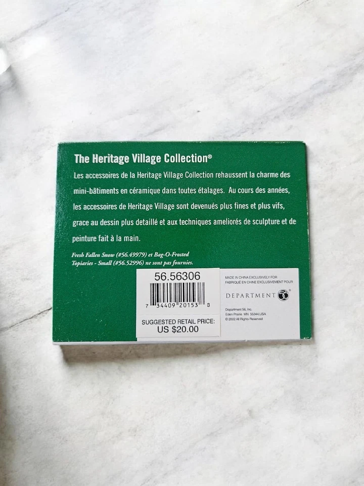 Department 56 “The Finishing Touch” de la colección Alpine Foto 3 de 4