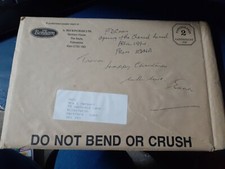 postally used envelope england has rip to front comes empty