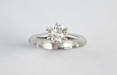 PLATINUM SOLITAIRE RING SET WITH ONE 0.91CT. F/SI1 BRILLIANT CUT DIAMOND