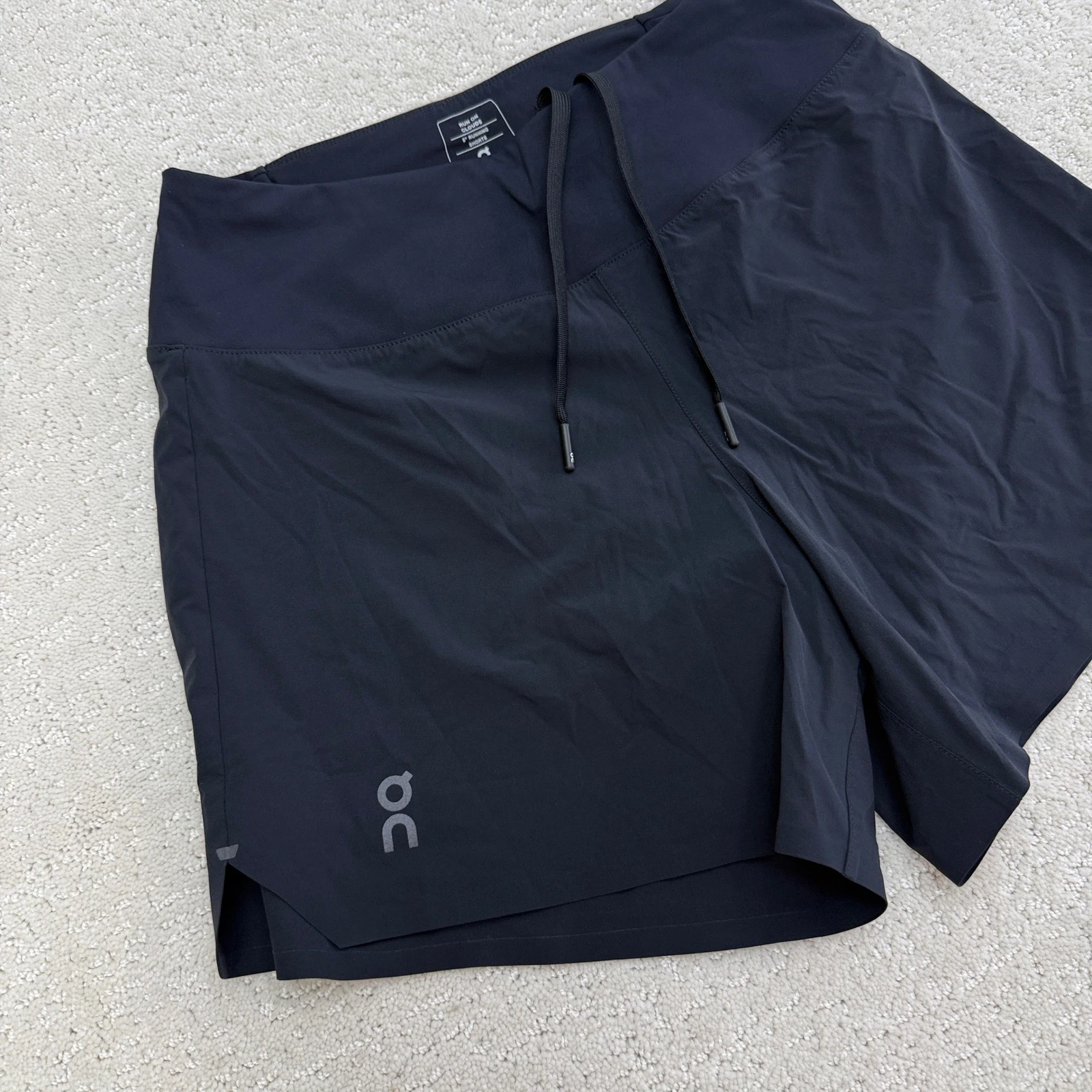 On Cloud 5" Running Shorts Women XS Black Zipper Pocket Reflective Logo Athletic