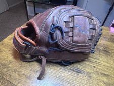 Used Insignia 12 Inch Softball/Baseball Glove. Made In the USA.