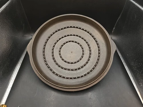 Wagner 5 Qt Dutch Oven lid with the letter "H" embossed in the center