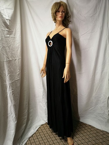 spaghetti strap black dress with circle 