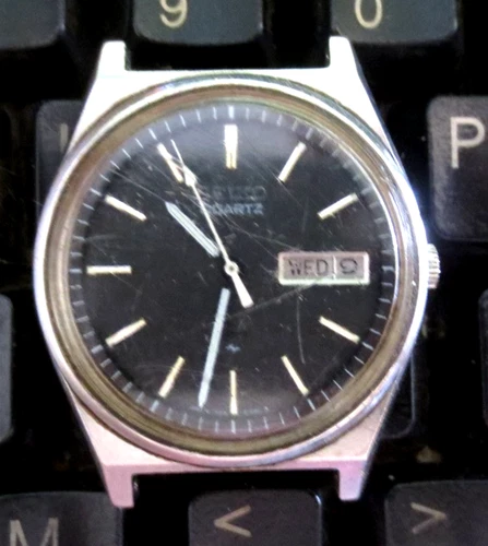 Seiko Men's Silver Stainless Watch Black Dial Vintage 7123-8439 P Day Date SQ