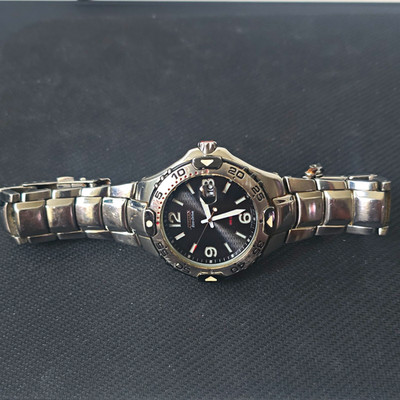 Citizen Eco-Drive WR200 Quartz Date Black Dial SS Bracelet 100m Diver Bezel