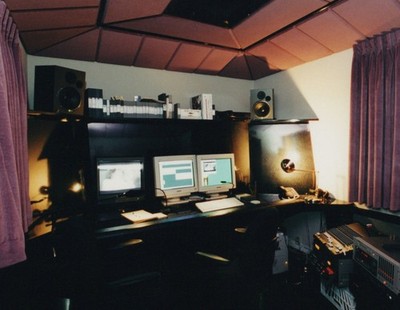 Computer Editing Room Multiple Monitors Speakers Dark Ceiling Acoustic Panels