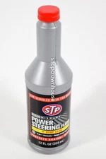 STP High Mileage Power Steering Fluid & Stop Leak 12 ounce bottle