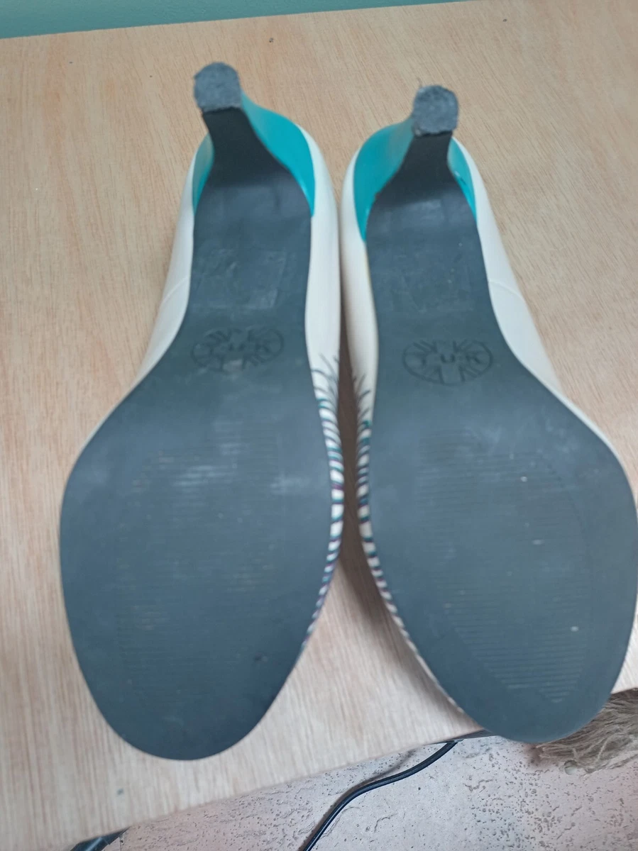 Tuk store peacock heels