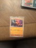 Pokémon TCG Trapinch 104/191 Sv08: Surging Sparks Reverse Holo