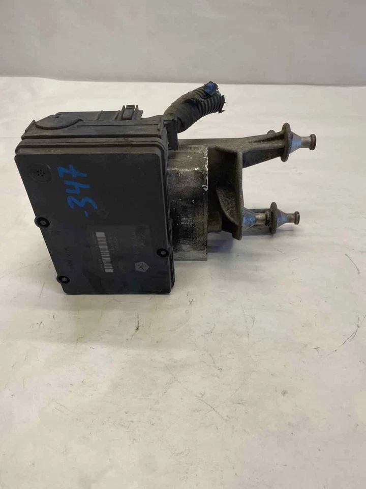 Conjunto de unidad de módulo de control de bomba ABS 2005-2007 Dodge Magnum 2,7 L tracción delantera G Foto 3 de 4