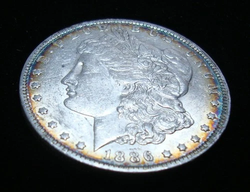 1886 O Morgan Silver Dollar  uncirculated w/ toning & luster ab804