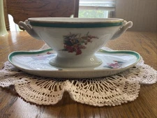 Double handled gravy boat w/attached underplate, green borders, flower bouquets 