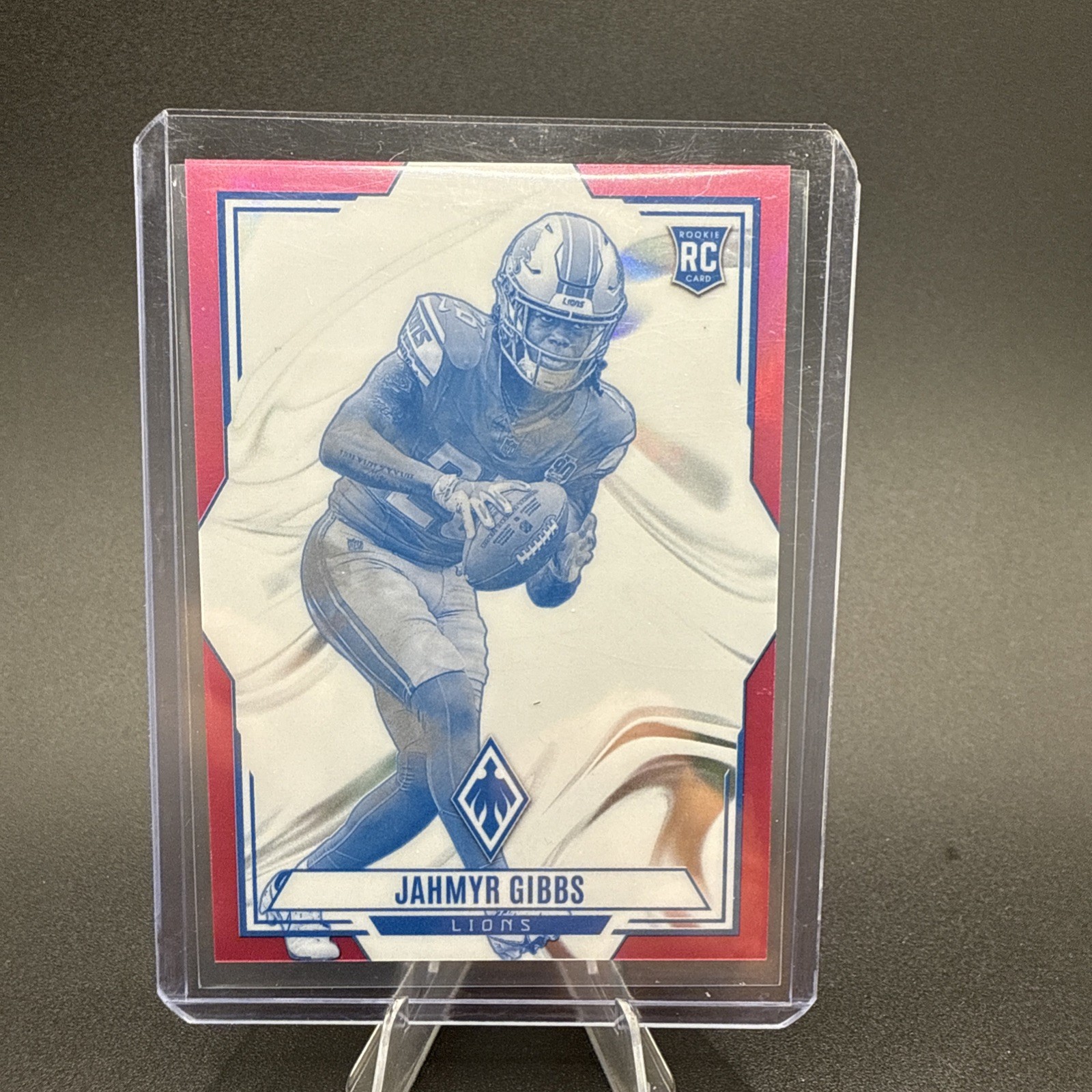 2023 Panini Phoenix - Contours Jahmyr Gibbs #CON-8 Pink /175 (RC)