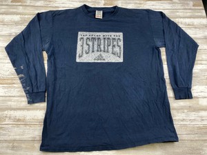 the brand with the three stripes shirt