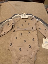 Four pack long sleeve bodysuit 12 Month New