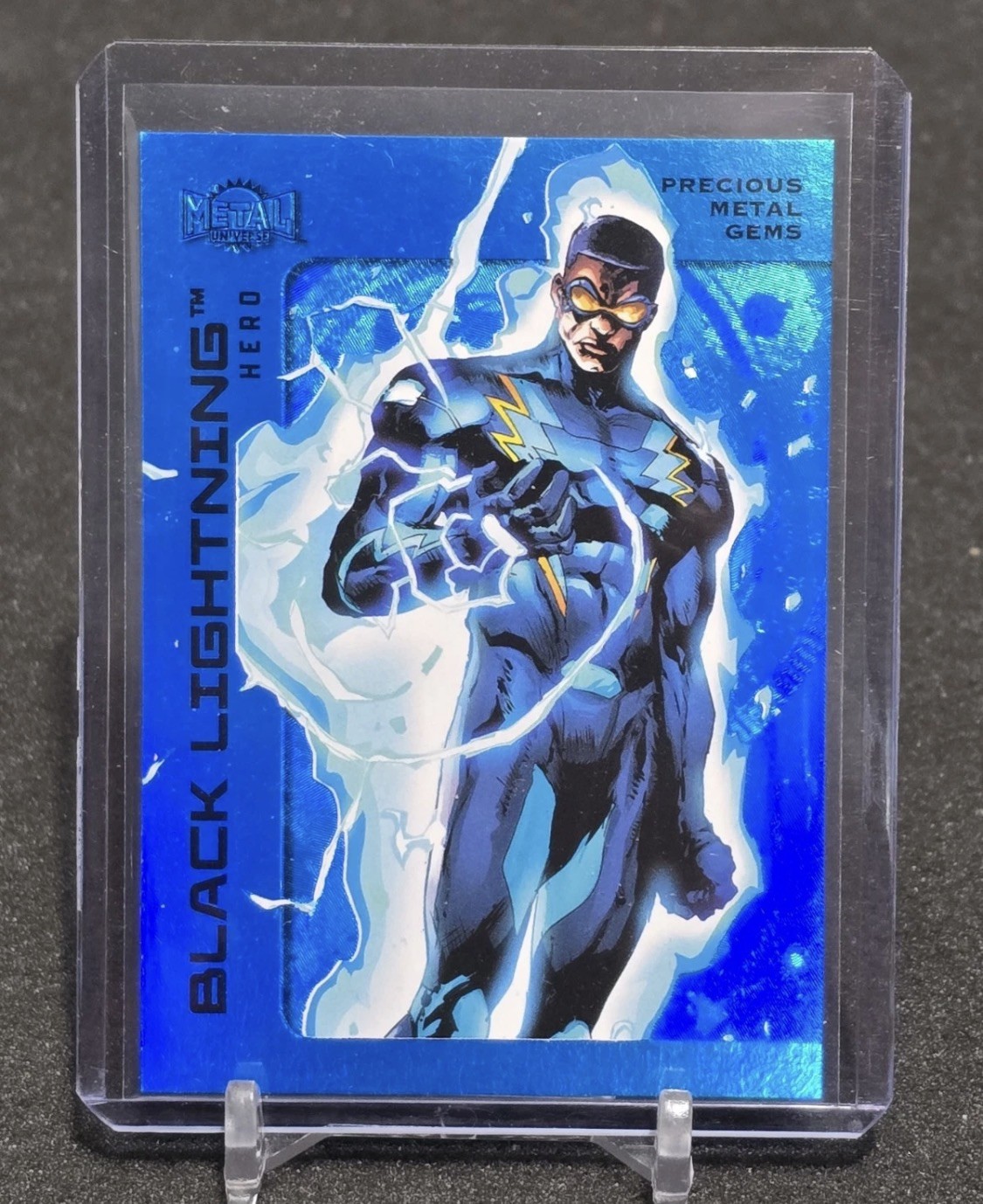 2025 Skybox Metal Universe Batman PMG Blue 13/50 Black Lightning #38