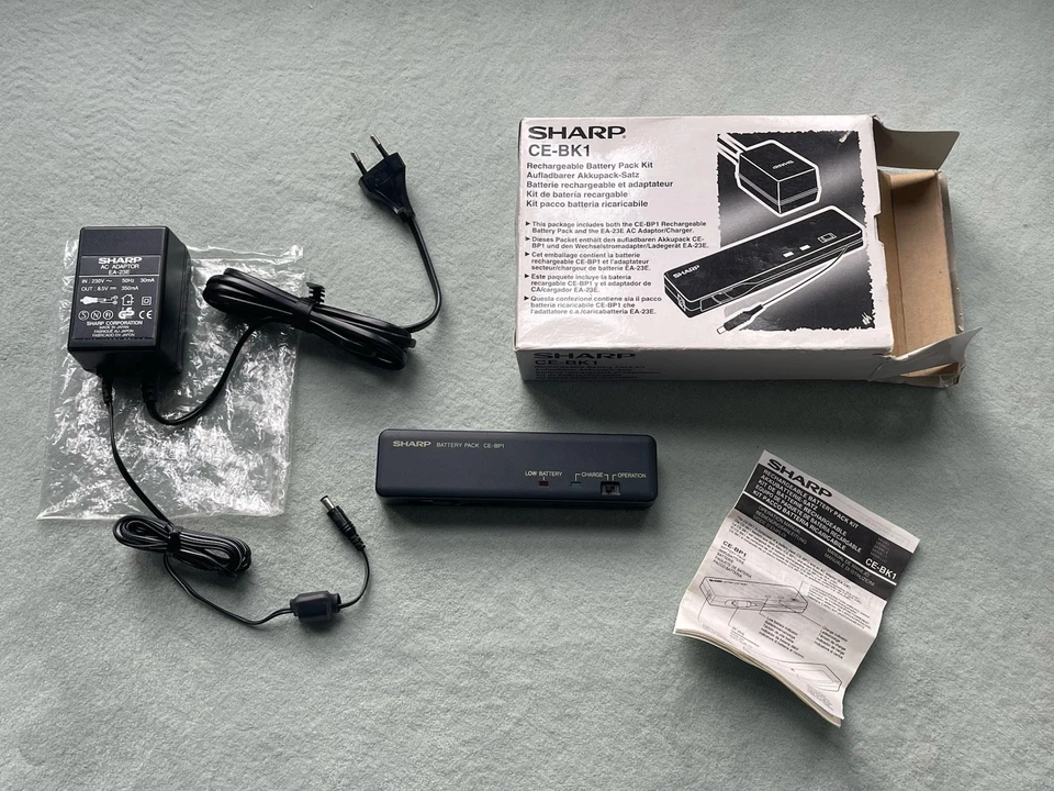 SHARP CE-BK1 - Externer Akku + Ladegerät - CE BP1 / EA-23E - TOP Sammerzustand !