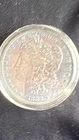 lot of 2 morgan silver dollars Toned 1882-o And Uncirculated 1886