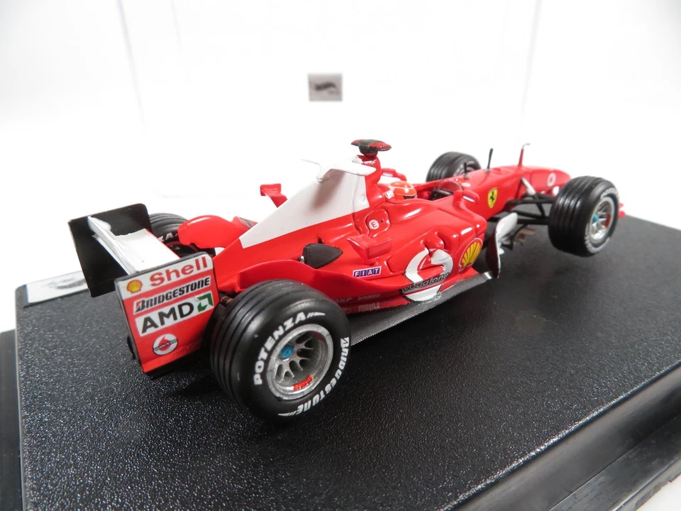 1:43 Hot Wheels Ferrari F2004 M. Schumacher F1 Rennwagen  - Bild 4 von 4