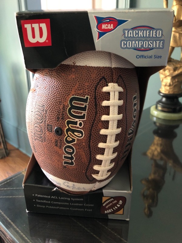 Miami Hurricanes Memorabilia Collection: Football, Cap, Watch, Figure and Glass.