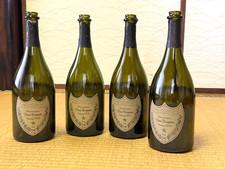 Set 4 bottiglie di champagne vuote Dom Perignon vintage 2010 2012 2013 usate