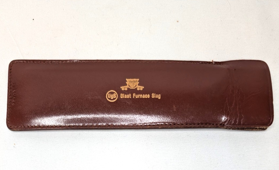 A US Steel promotional slide rule for calculating blast furnace slag — a hyper-specific industrial artifact that tells a whole story about mid-century American heavy industry.