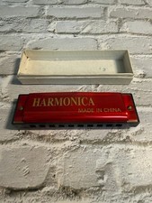 Red Harmonica Made in China Works, Great for Beginner